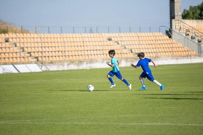 kids playing football