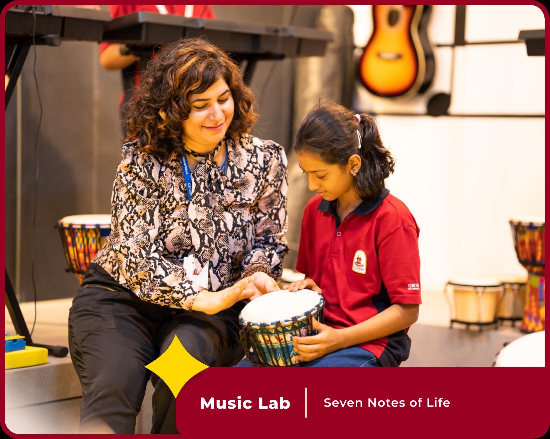 Students practicing music at Orchids International School, one of the top 10 CBSE schools.