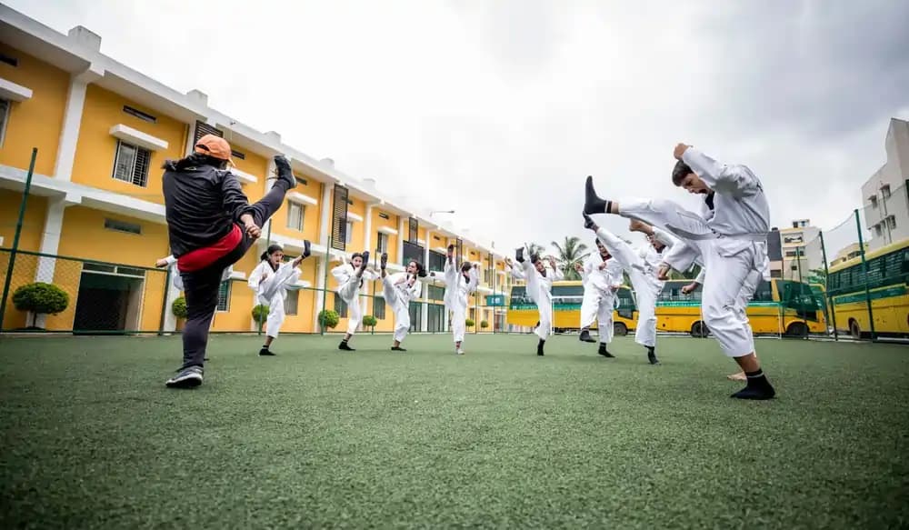 Students practicing martial arts at Orchids International School, one of the top 10 CBSE schools. Students practicing martial arts at Orchids International School, one of the top 10 CBSE schools.